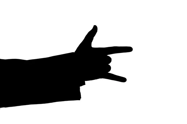 Man 's hand indicates horns black — стоковое фото