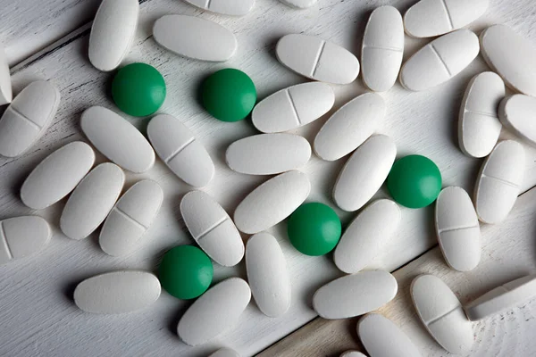 White Green Pills Wooden Table Top View — Stock Photo, Image