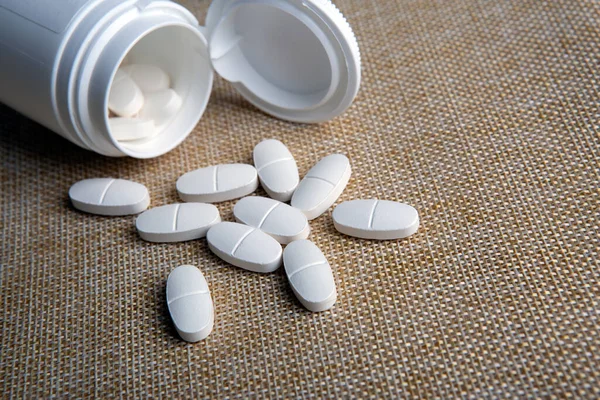 White Pills Jar Napkin Close — Stock Photo, Image