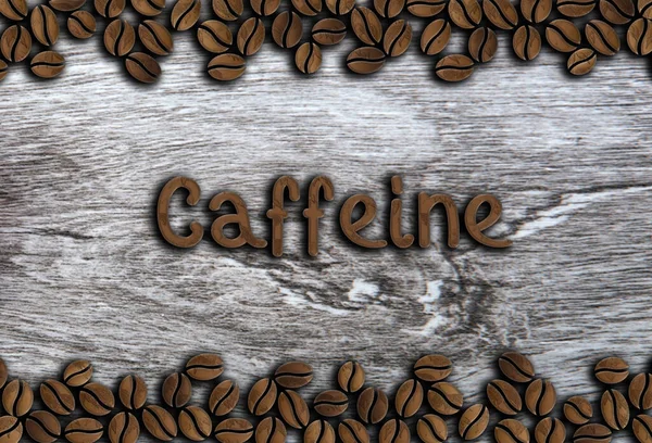 在木制背景图上印有咖啡因字样的咖啡豆 免版税图库照片
