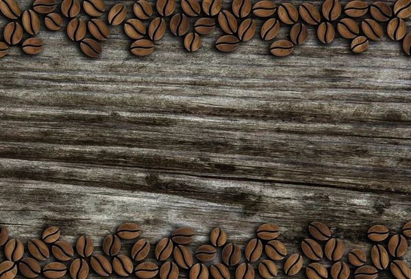 木制背景图上一排咖啡豆 图库图片