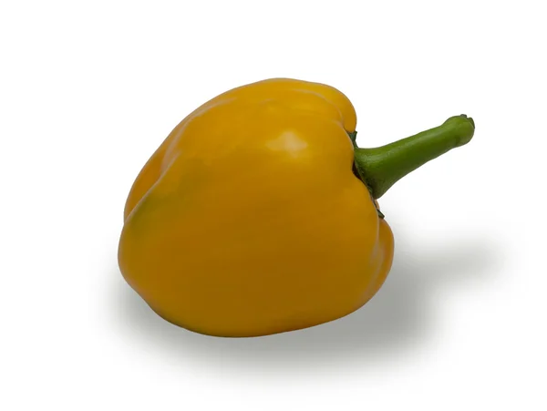 Yellowsweet peppar över vita bak — Stockfoto