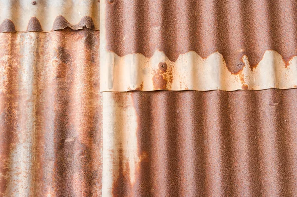 Paslı kıvrımlı metal duvar dokusu arkaplanı — Stok fotoğraf
