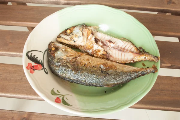 Fried Mackerel in dish on wooden tabl — Stock Photo, Image