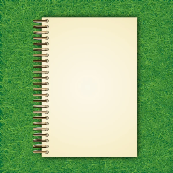 Carnet ouvert avec page blanche sur fond d'herbe verte - illust — Photo