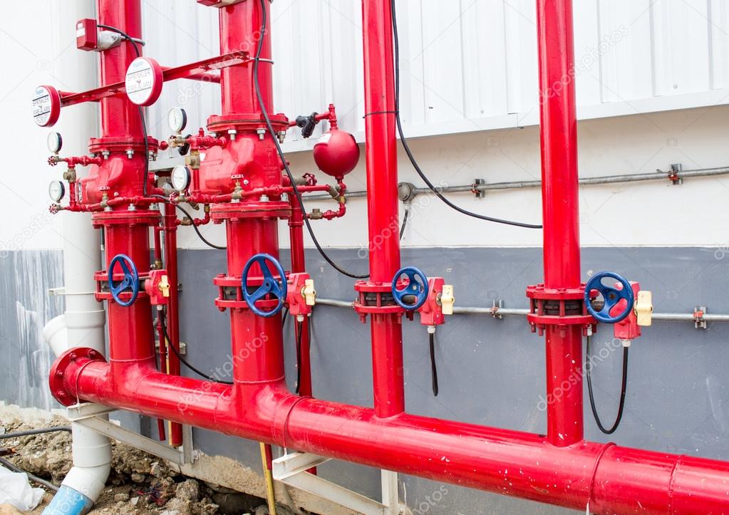 Pipes and Valves Inside Industrial Facility 