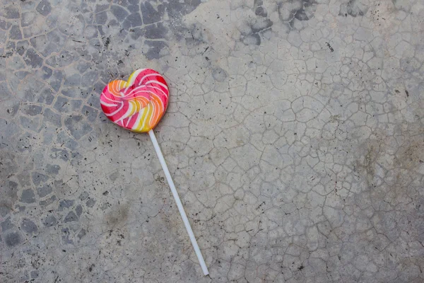 Lollipops on a stone background — Stock Photo, Image