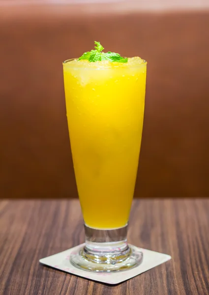 Mango smoothie on table — Stock Photo, Image