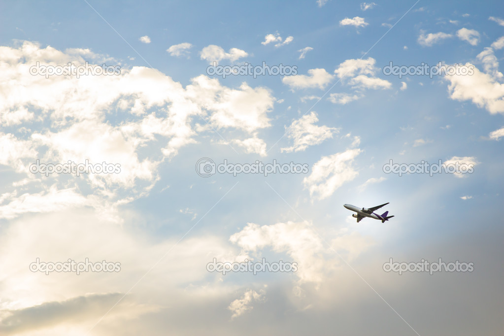 Plane crossing a cloud vignette