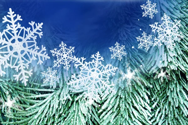 Sneeuwvlok kaart met blauwe achtergrond — Stockfoto