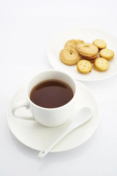 Caneca de chá em um fundo branco — Fotografia de Stock
