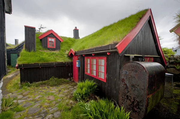 Far Oer downtown grass roof wood house — Zdjęcie stockowe