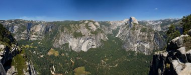 A beautifuly sunny view of yosemite valley park half dome clipart