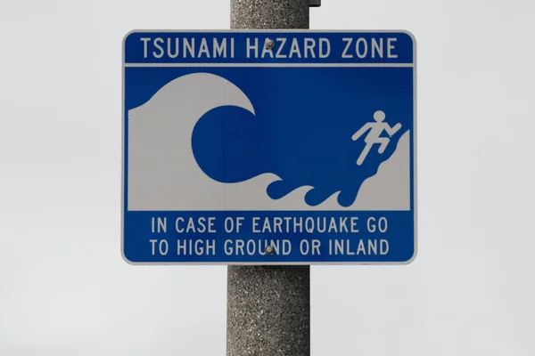 Tsunami hazard zone danger sign — Stock Photo, Image