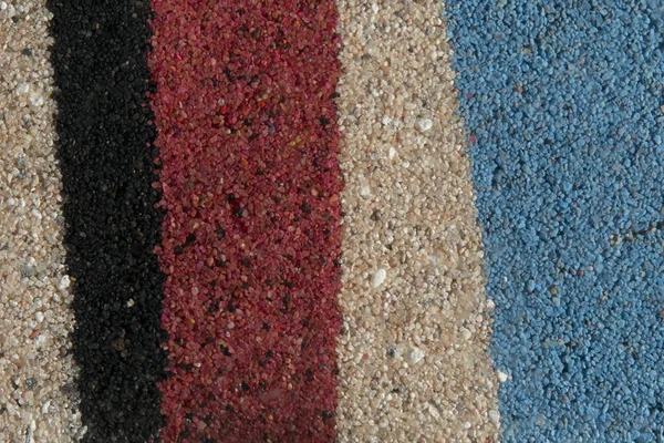 Sand textur bakgrunden vit röd svart och blå — Stockfoto