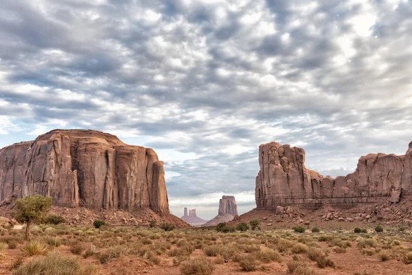 Monument Valley view on cloudy sky background — Stock Photo, Image