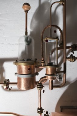 Copper still alembic inside distillery clipart