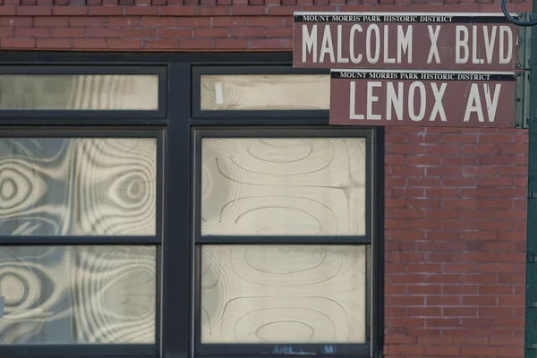 New York Malcom X Boulevard Lenox Avenue street sign — Stock Photo, Image
