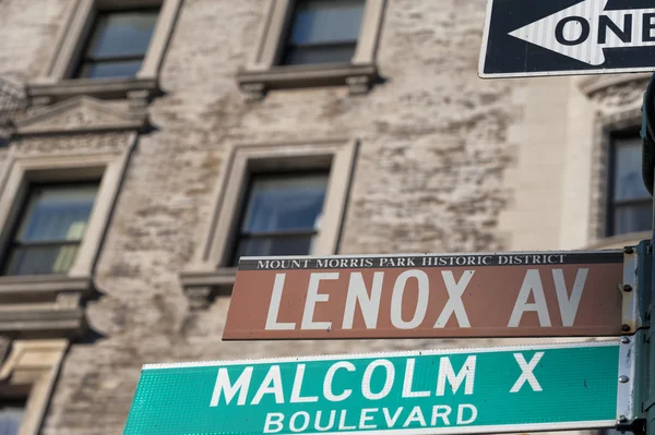 New York Malcom X Boulevard Lenox Avenue street sign — Stock Photo, Image