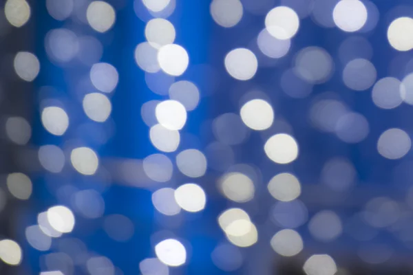 Licht auf blauem Bokeh — Stockfoto