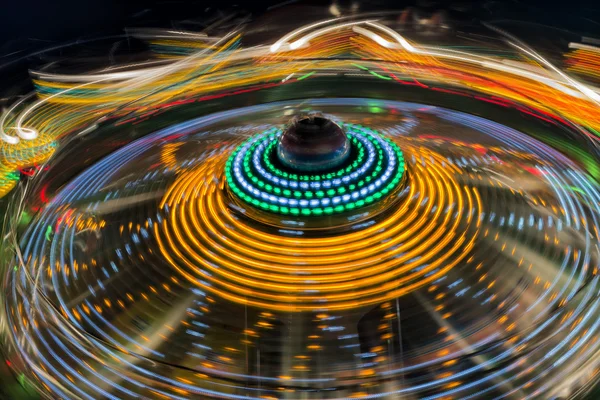 Luna park bewegende lichten achtergrond — Stockfoto