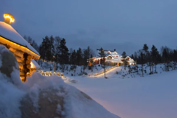 Laponia Elf edificios mientras nieva — Foto de Stock