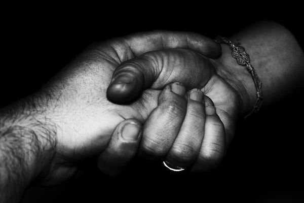 Lovers man and woman crossed hands — Stock Photo, Image