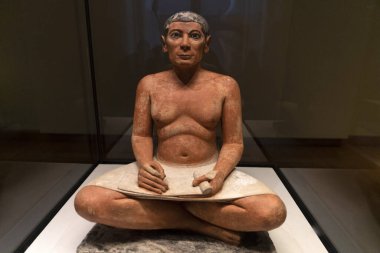 Güzel sanat heykelciği. Antik Mısır. Yazman.