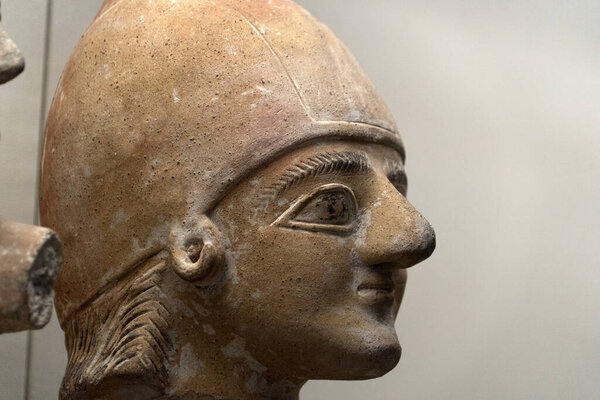 Old Cyprus head sculpture close up detail