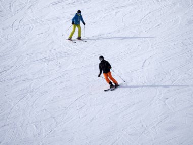 stilish skier skiing in dolomites gardena valley snowy mountains 