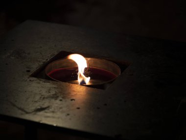 wax candle flame light on black background