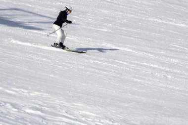 stilish skier skiing in dolomites badia valley snowy mountains 