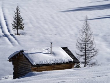 dolomites snow panorama wooden hut val badia armentara hill