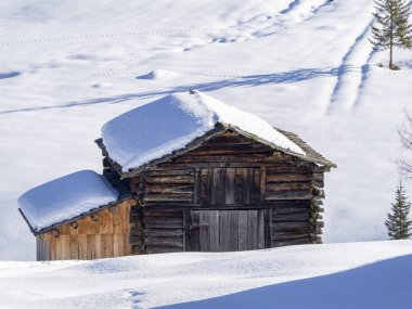dolomites snow panorama wooden hut val badia armentara hill
