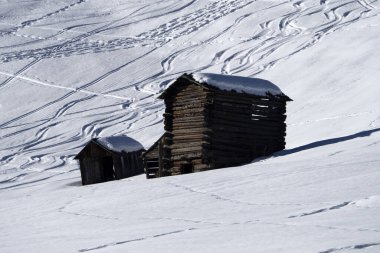 dolomites snow panorama wooden hut val badia armentara hill