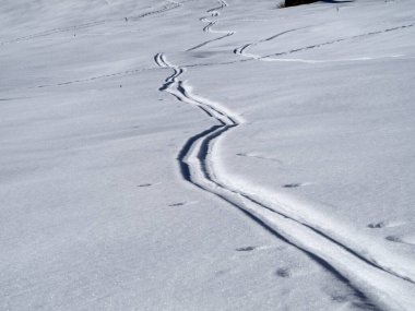 dolomites snow panorama alpine ski tracks detail off slope track