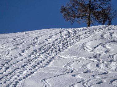 dolomites snow panorama alpine ski tracks detail off slope track
