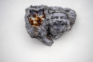 wood carved elf sculpture detail