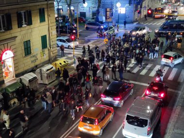 GENOA, ITALY - JANUARY 15 2022 - No green pass no vax protest in city street at night