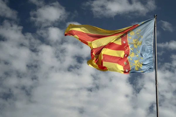Waving Valencia Spain Flag Blue Sky Background — Zdjęcie stockowe