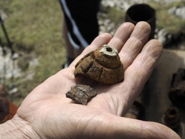 detail of first world war weapons found on Piana Mountain dolomites, Italy