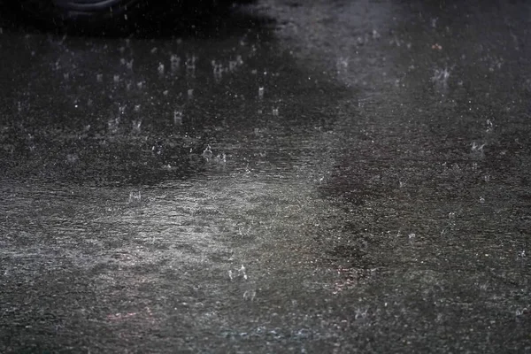 heavy rain on the street in chinatown new york city manhattan