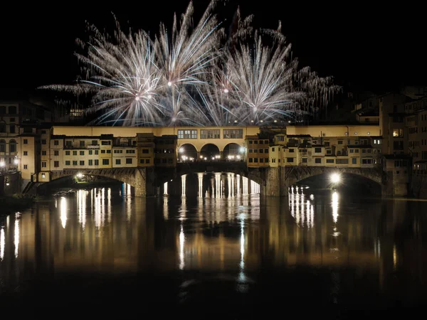 fire works fireworks on ponte vecchio bridge florence at night view