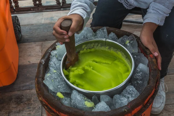 Lemon snow made by hand, you can see the hands of the craftsman making the snow