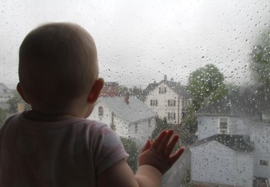 Toddler waiting at the window clipart