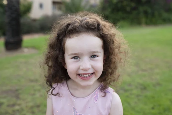 Cutie Child Plays Looks You Cheerfully Portrait Girl Curly Hair — Fotografia de Stock