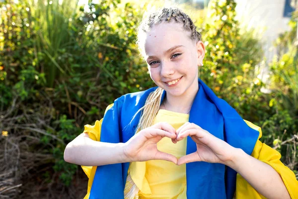 Cute Child Flag Ukraine Shows Heart Her Hands Caucasian Girl — Stok fotoğraf