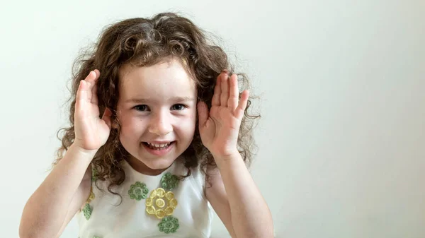 Cute Positive Baby Curly Years Old Girl Plays Hide Seek — Foto de Stock