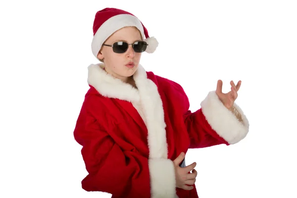 Jongen als santa claus luchtgitaar spelen — Stockfoto