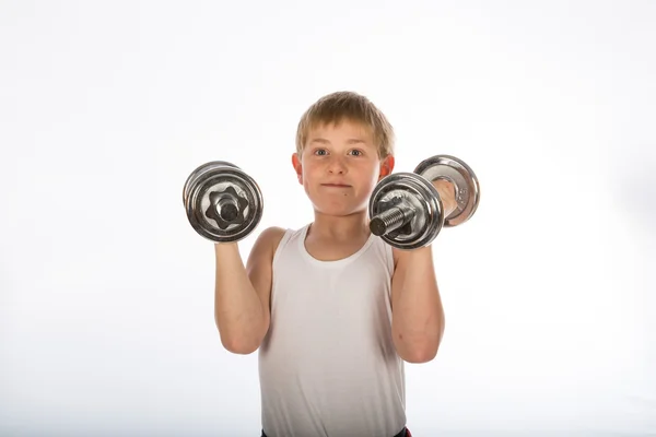 genç erkek ile iki halter egzersiz